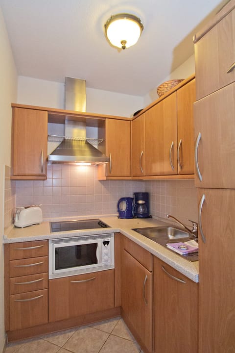 Apartment, 2 Bedrooms, Sea View | Private kitchen | Full-size fridge, microwave, dishwasher, coffee/tea maker