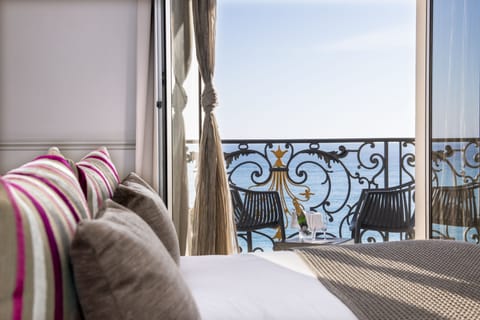 Triple Room, Sea View | In-room safe, desk, free WiFi, bed sheets