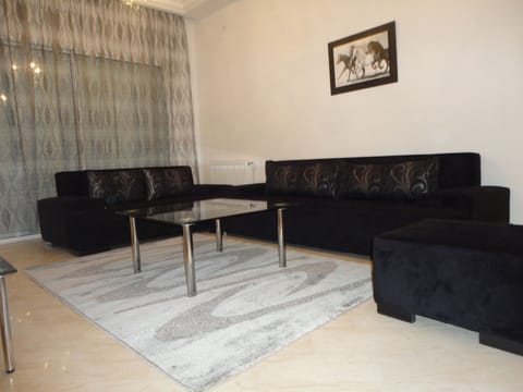 Premier Apartment, 2 Bedrooms | Living room | 32-inch LED TV with satellite channels, TV