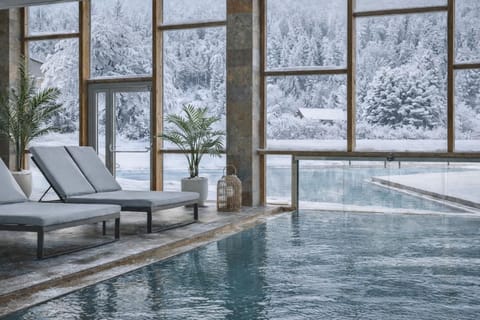 Indoor pool, outdoor pool, pool umbrellas, sun loungers
