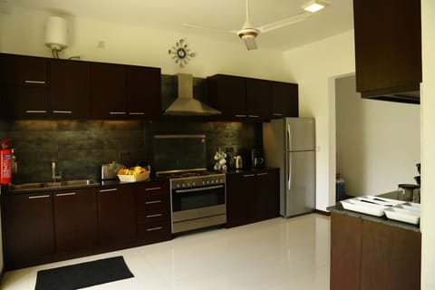 Deluxe Villa, Multiple Bedrooms, Garden View | Private kitchen | Fridge, microwave, coffee/tea maker, electric kettle