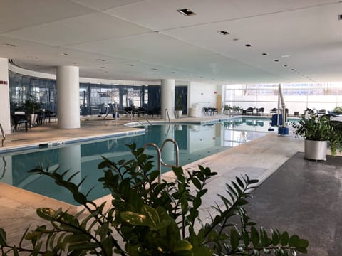 Indoor pool, open 6:00 AM to 11:00 PM, sun loungers