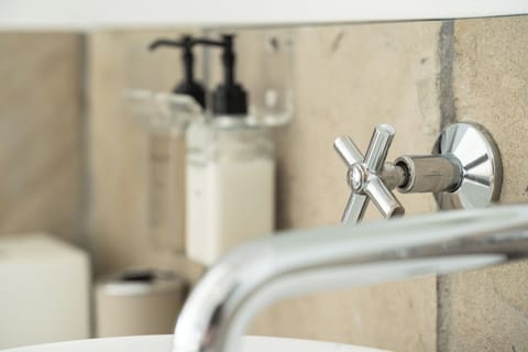 Sea View Room - Open plan bathroom (1) | Bathroom | Shower, hair dryer, towels, soap