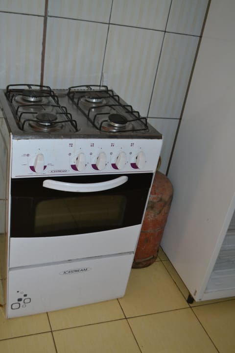 Apartment, 1 Bedroom | Private kitchen | Full-size fridge, microwave, stovetop, coffee/tea maker