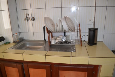 Apartment, 1 Bedroom | Private kitchen | Full-size fridge, microwave, stovetop, coffee/tea maker