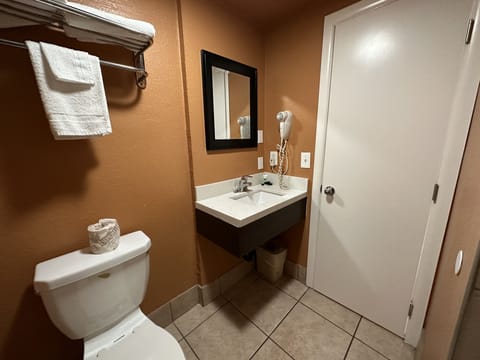 Basic Room, 1 Queen Bed, Non Smoking | Bathroom | Shower, hair dryer, towels