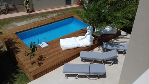 Seasonal outdoor pool, pool umbrellas, sun loungers