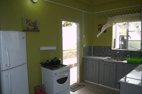 Tobago Apartment | Private kitchen | Fridge, microwave, stovetop