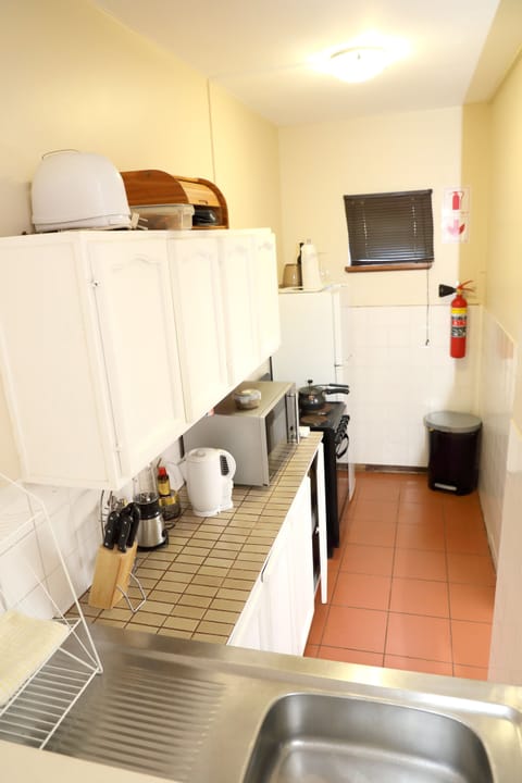 Family Suite, 2 Bedrooms | Private kitchen | Microwave, electric kettle