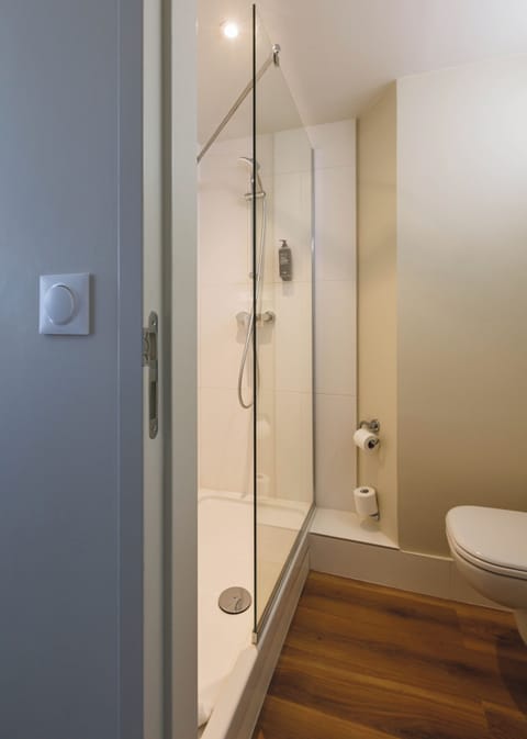 Shower, eco-friendly toiletries, hair dryer, towels