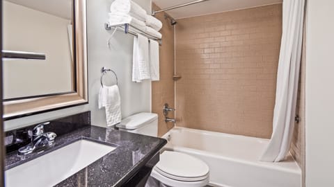 Suite, 1 King Bed, Non Smoking, Refrigerator & Microwave | Bathroom | Free toiletries, hair dryer, towels, soap