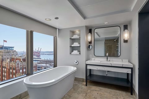 Junior Suite, 1 King Bed (Grand) | Bathroom | Separate tub and shower, rainfall showerhead, designer toiletries