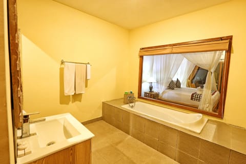 Standard Villa, 1 King Bed, Garden Area | Bathroom | Combined shower/tub, free toiletries, hair dryer, towels