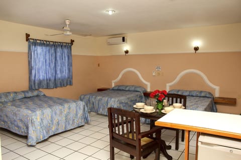 Family Triple Room, Multiple Beds, Kitchenette | Minibar, individually decorated, individually furnished