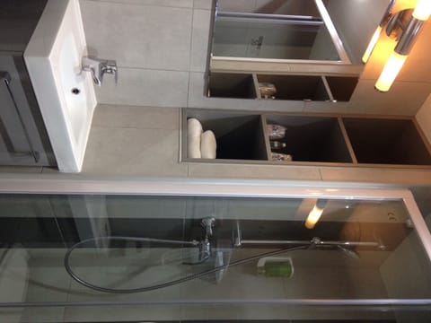 Shower, free toiletries, hair dryer, towels