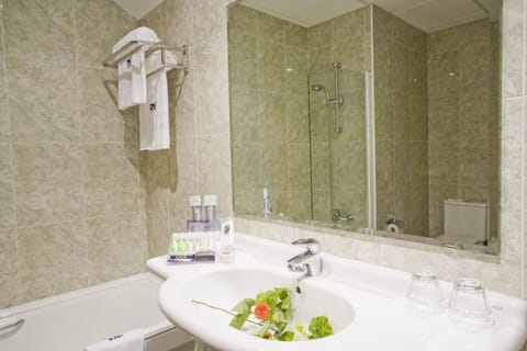 Deep soaking tub, eco-friendly toiletries, hair dryer, bidet