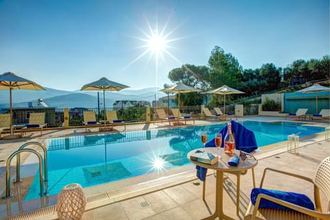 Seasonal outdoor pool, pool umbrellas, sun loungers