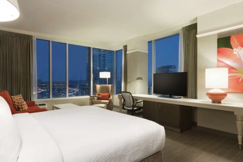 Executive Suite, 1 King Bed, Corner | Desk, laptop workspace, blackout drapes, iron/ironing board