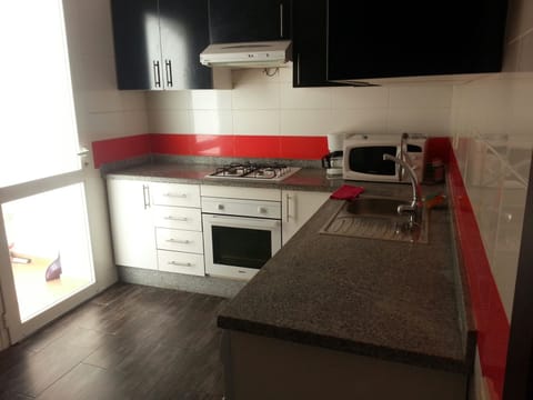 Traditional Apartment, 3 Bedrooms (Bouznika 8) | Private kitchen | Full-size fridge, microwave, oven, stovetop