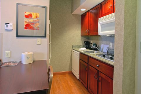 Full-size fridge, microwave, stovetop, dishwasher