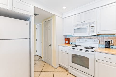 Condo, 2 Bedrooms | Private kitchen | Microwave, coffee/tea maker, cookware/dishes/utensils