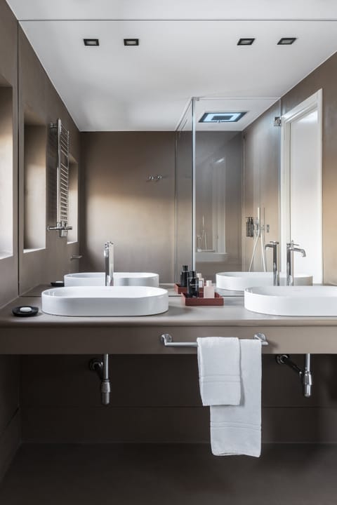 Suite | Bathroom | Designer toiletries, hair dryer, slippers, bidet