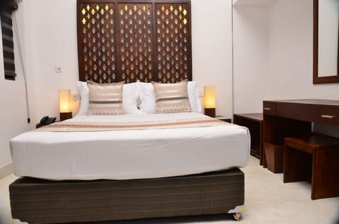 Standard Room | Premium bedding, minibar, in-room safe, desk