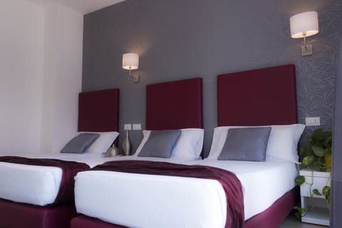 Triple Room | Premium bedding, down comforters, in-room safe, desk