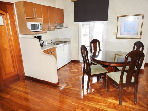 Exclusive Apartment, 2 Bedrooms | Private kitchen | Coffee/tea maker, electric kettle