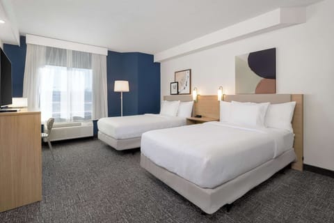 Desk, laptop workspace, blackout drapes, iron/ironing board