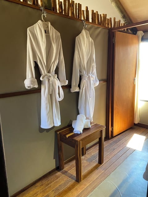 Tented Chalet | Bathroom | Shower, hair dryer, bathrobes, slippers