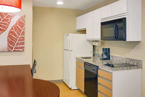 Suite, 1 Queen Bed with Sofa bed, Non Smoking | Private kitchen | Full-size fridge, microwave, stovetop, dishwasher