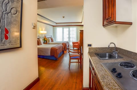 Junior Suites, 2 Double Beds | Private kitchen | Mini-fridge, microwave, coffee/tea maker, cookware/dishes/utensils