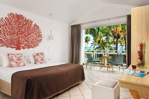 Coral Signature Garden View | Minibar, in-room safe, individually decorated, individually furnished