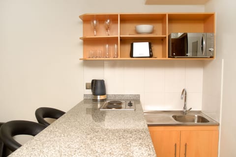 Apartment, 1 Bedroom | Private kitchen | Fridge, microwave, stovetop, electric kettle