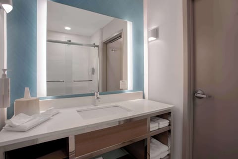 Suite, 1 King Bed | Bathroom | Hair dryer, towels