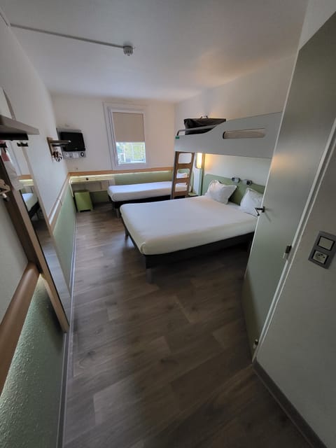 Family Room | Individually furnished, desk, blackout drapes, soundproofing