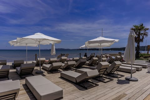 Beach nearby, sun loungers, beach umbrellas