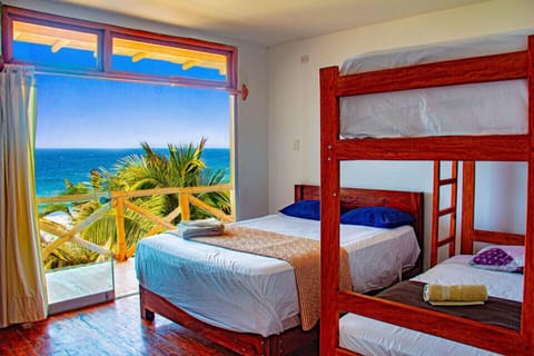 Quadruple Room, Beach View | Premium bedding, down comforters, pillowtop beds, iron/ironing board