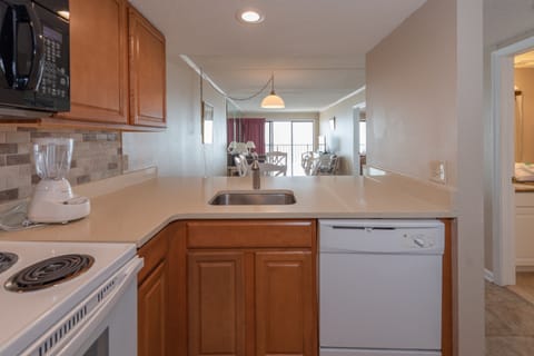 Condo, 2 Bedrooms | Private kitchen | Fridge, microwave, stovetop, dishwasher