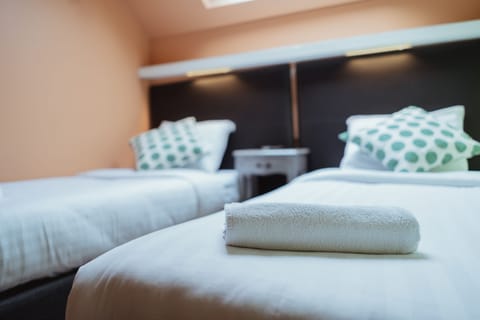 Pillowtop beds, individually decorated, desk, iron/ironing board