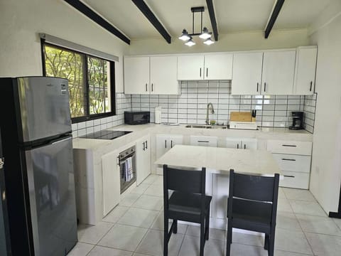 Villa | Private kitchen | Full-size fridge, oven, stovetop, coffee/tea maker