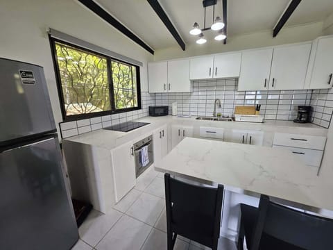 Villa | Private kitchen | Full-size fridge, oven, stovetop, coffee/tea maker