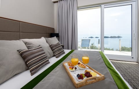 Luxury Double or Twin room, Sea view | Hypo-allergenic bedding, minibar, in-room safe, desk