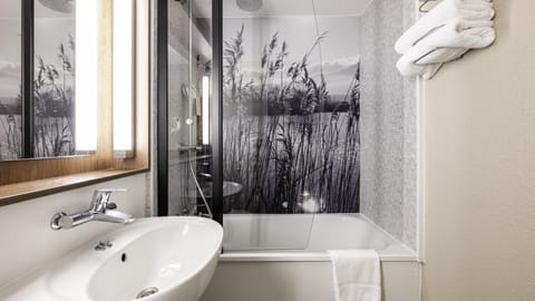 Eco-friendly toiletries, hair dryer, towels, soap