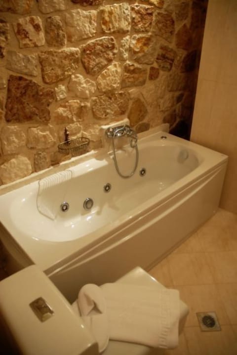 Suite, Partial Sea View | Deep soaking bathtub