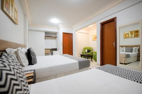 Deluxe Twin Room | Minibar, blackout drapes, free WiFi, bed sheets