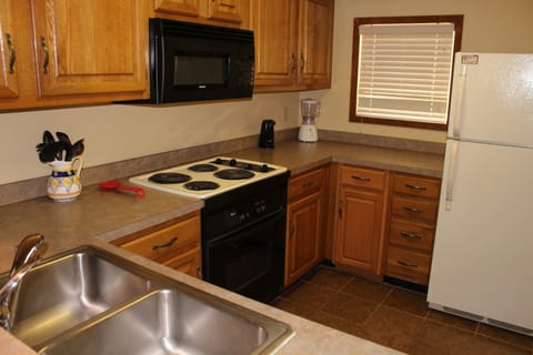 Deluxe Condo, 2 Bedrooms | Private kitchen | Fridge, microwave, coffee/tea maker