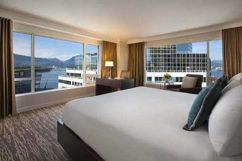 Signature Harbor and Stanley Park View Corner Room, 1 King Bed | Premium bedding, down comforters, pillowtop beds, minibar