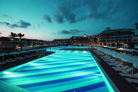 Indoor pool, seasonal outdoor pool, pool umbrellas, sun loungers